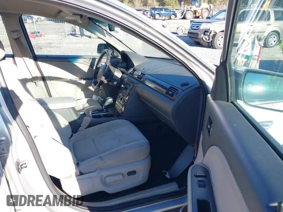 ✅ 2009 Ford Taurus SE • VIN: 1FAHP23W79G118390 • Lot: 40930355. Listed on IAAI with 246,400 mi. Free auction sales archive from the USA and detailed vehicle history report at DreamBid. Image 5.
