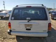 ✅ 2001 Jeep Cherokee Sport • VIN: 1J4FT48S61L576779 • Lot: 86999455. Listed on Copart with 245,218 mi. Free auction sales archive from the USA and detailed vehicle history report at DreamBid. Image 6.