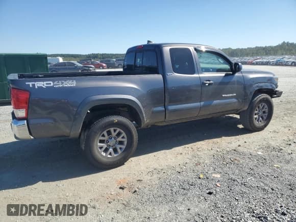 ✅ 2017 Toyota Tacoma SR5 • VIN: 5TFSZ5AN1HX053606 • Lot: 81950205. Wystawiony na Copart z przebiegiem 99 772 mil. Bezpłatny archiwum sprzedaży aukcyjnych z USA i szczegółowy raport historii pojazdu na DreamBid. Zdjęcie 3.