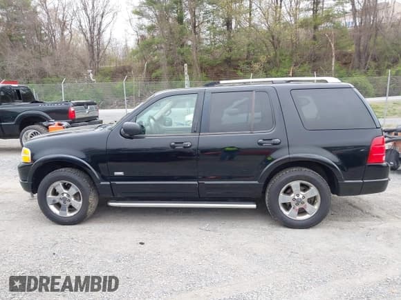 ✅ 2003 Ford Explorer Limited • VIN: 1FMDU75W23UC01032 • Lot: 41922485. Wystawiony na IAAI z przebiegiem 318 766 mil. Bezpłatny archiwum sprzedaży aukcyjnych z USA i szczegółowy raport historii pojazdu na DreamBid. Zdjęcie 14.