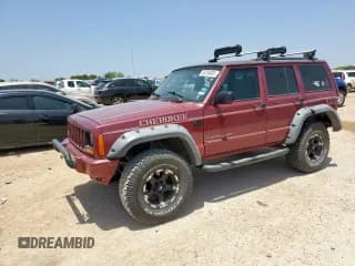 ✅ 1999 Jeep Cherokee Sport • VIN: 1J4FT68S5XL675839 • Lot: 65230005. Listed on Copart with 204,102 mi. Free auction sales archive from the USA and detailed vehicle history report at DreamBid. Image 1.