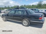 ✅ 1990 Lincoln Continental • VIN: 1LNLM9845LY650585 • Lot: 61182525. Listed on Copart with 145,566 mi. Free auction sales archive from the USA and detailed vehicle history report at DreamBid. Image 2.
