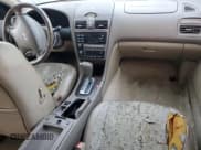 ✅ 2001 Infiniti I30 Luxury • VIN: JNKCA31A51T022433 • Лот: 73953574. Опубликован ранее на Copart с пробегом Не указан. Бесплатный доступ к архиву аукционных продаж из США и подробный отчёт об истории автомобиля на DreamBid. Изображение 8.