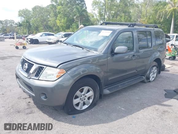 ✅ 2009 Nissan Pathfinder SE • VIN: 5N1AR18B49C612442 • Lot: 41792183. Listed on IAAI with 225,049 mi. Free auction sales archive from the USA and detailed vehicle history report at DreamBid. Image 2.