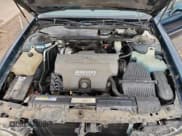 ✅ 1998 Buick LeSabre Custom • VIN: 1G4HP52K4WH546798 • Lot: 81989525. Wystawiony na Copart z przebiegiem 169 914 mil. Bezpłatny archiwum sprzedaży aukcyjnych z USA i szczegółowy raport historii pojazdu na DreamBid. Zdjęcie 11.