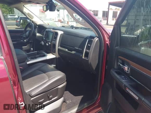 2017 Ram 1500 Laramie z VIN 1C6RR6NT2HS818002, wystawiony jako IAAI lot #42720321 z przebiegiem 89 641 mil mil oraz . Historia ofert i sprzedaży dostępna na DreamBid. Obrazek 5.