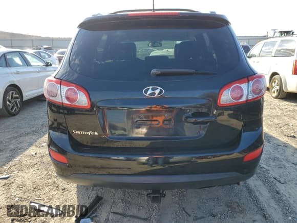 ✅ 2012 Hyundai Santa Fe SE • VIN: 5XYZH4AG1CG158882 • Lot: 82795534. Listed on Copart with 155,903 mi. Free auction sales archive from the USA and detailed vehicle history report at DreamBid. Image 6.