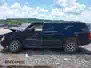 2014 Chevrolet Suburban LT with VIN 1GNSKJE77ER233057, listed as a IAAI auction lot 42696074 with 151,658 mi miles and . Bid and sale history available at DreamBid. Image 15.