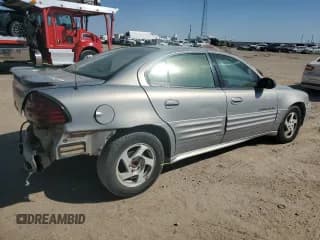 ✅ 2000 Pontiac Grand Am SE1 • VIN: 1G2NF52E8YM883123 • Lot: 74504254. Wystawiony na Copart z przebiegiem 196 077 mil. Bezpłatny archiwum sprzedaży aukcyjnych z USA i szczegółowy raport historii pojazdu na DreamBid. Zdjęcie 3.