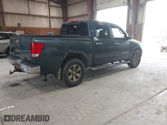 ✅ 2005 Nissan Titan LE • VIN: 1N6AA07B55N500154 • Lot: 42455068. Listed on IAAI with 147,180 mi. Free auction sales archive from the USA and detailed vehicle history report at DreamBid. Image 4.