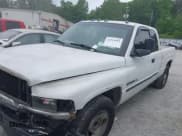 ✅ 2001 Dodge 1500 • VIN: 3B7HC13Y21M577029 • Lot: 42113953. Listed on IAAI with 329,493 mi. Free auction sales archive from the USA and detailed vehicle history report at DreamBid. Image 2.