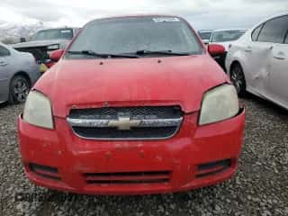 2011 Chevrolet Aveo 1LT z VIN KL1TD5DE3BB122404, wystawiony jako Copart lot #84107004 z przebiegiem 185 609 mil mil oraz Szkoda całkowita • Salvage title. Historia ofert i sprzedaży dostępna na DreamBid. Obrazek 5.