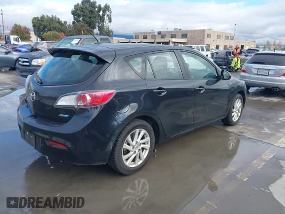 ✅ 2012 Mazda 3 i Touring • VIN: JM1BL1L74C1579670 • Lot: 43733155. Listed on IAAI with 111,081 mi. Free auction sales archive from the USA and detailed vehicle history report at DreamBid. Image 4.