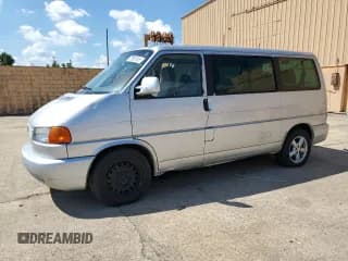 ✅ 2002 Volkswagen EuroVan GLS • VIN: WV2KB47092H076225 • Лот: 70983195. Опубликован ранее на Copart с пробегом 170 029 миль. Бесплатный доступ к архиву аукционных продаж из США и подробный отчёт об истории автомобиля на DreamBid. Изображение 1.