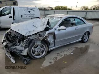 ✅ 2004 Mercedes-Benz CLK 500 • VIN: WDBTJ75J24F118671 • Лот: 50655795. Опубликован ранее на Copart с пробегом 143 620 миль. Бесплатный доступ к архиву аукционных продаж из США и подробный отчёт об истории автомобиля на DreamBid. Изображение 1.