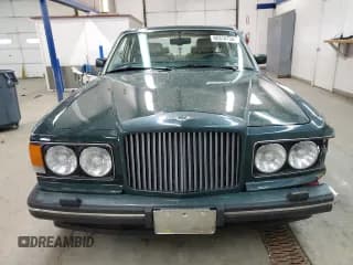 ✅ 1993 Bentley Brooklands • VIN: SCBZE02D0PCX46629 • Lot: 86314134. Wystawiony na Copart z przebiegiem 111 198 mil. Bezpłatny archiwum sprzedaży aukcyjnych z USA i szczegółowy raport historii pojazdu na DreamBid. Zdjęcie 5.