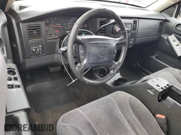 2003 Dodge Dakota SLT with VIN 1D7HL42N93S105421, listed as a Copart auction lot 83088264 with 210,194 mi miles and Salvage title. Bid and sale history available at DreamBid. Image 8.