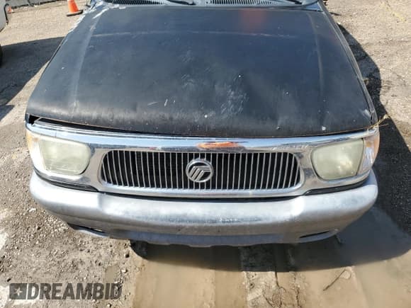 ✅ 1999 Mercury Mountaineer • VIN: 4M2ZU54E4XUJ10982 • Lot: 71061635. Wystawiony na Copart z przebiegiem 247 403 mil. Bezpłatny archiwum sprzedaży aukcyjnych z USA i szczegółowy raport historii pojazdu na DreamBid. Zdjęcie 12.