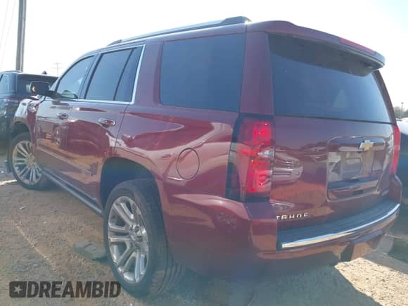 2020 Chevrolet Tahoe Premier z VIN 1GNSKCKJ6LR186564, wystawiony jako IAAI lot #41901414 z przebiegiem 129 156 mil mil oraz . Historia ofert i sprzedaży dostępna na DreamBid. Obrazek 3.