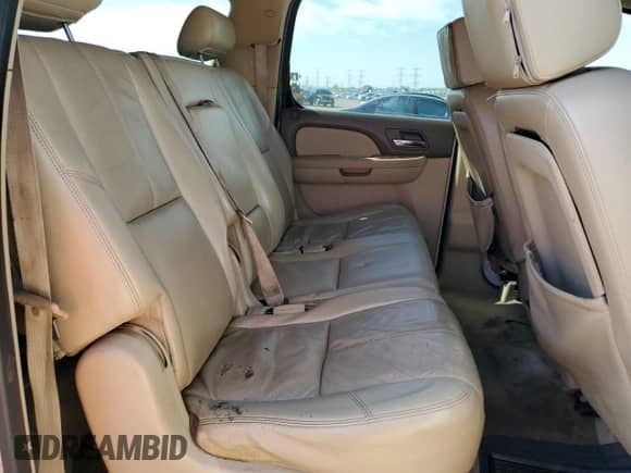 2010 Chevrolet Suburban LT z VIN 1GNUKJE33AR260045, wystawiony jako Copart lot #71088865 z przebiegiem Nie podano mil oraz Szkoda całkowita • Salvage title. Historia ofert i sprzedaży dostępna na DreamBid. Obrazek 11.