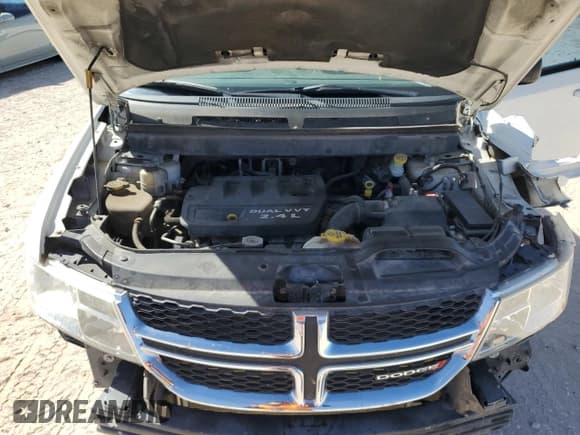 ✅ 2013 Dodge Journey SE • VIN: 3C4PDCAB5DT668504 • Lot: 82673085. Listed on Copart with 115,588 mi. Free auction sales archive from the USA and detailed vehicle history report at DreamBid. Image 12.