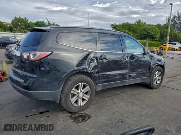 ✅ 2016 Chevrolet Traverse LT • VIN: 1GNKRGKD0GJ132923 • Lot: 96047465. Listed on Copart with 141,319 mi. Free auction sales archive from the USA and detailed vehicle history report at DreamBid. Image 3.