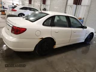 ✅ 2003 Saturn LS • VIN: 1G8JU54F13Y548819 • Лот: 75133444. Опубликован ранее на Copart с пробегом 694 978 миль. Бесплатный доступ к архиву аукционных продаж из США и подробный отчёт об истории автомобиля на DreamBid. Изображение 3.