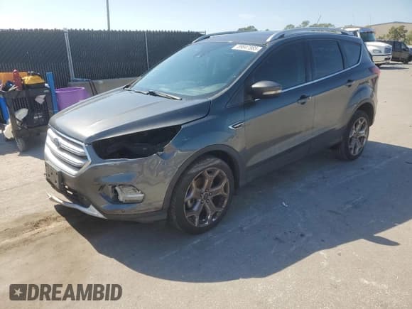 ✅ 2019 Ford Escape Titanium • VIN: 1FMCU0J98KUB99210 • Lot: 89847885. Listed on Copart with 97,586 mi. Free auction sales archive from the USA and detailed vehicle history report at DreamBid. Image 1.