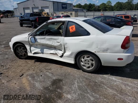✅ 1997 Mitsubishi Mirage LS • VIN: JA3AY31C0VU053268 • Lot: 73285174. Listed on Copart with 243,545 mi. Free auction sales archive from the USA and detailed vehicle history report at DreamBid. Image 2.