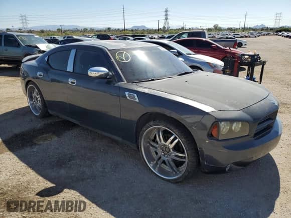 2007 Dodge Charger with VIN 2B3KA43R67H797756, listed as a Copart auction lot 58540464 with 188,934 mi miles and Salvage title. Bid and sale history available at DreamBid. Image 4.