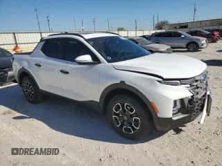 2023 Hyundai Santa Cruz SEL with VIN 5NTJCDAE8PH071054, listed as a Copart auction lot 81081134 with 9,609 mi miles and Salvage title. Bid and sale history available at DreamBid. Image 4.