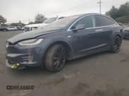 ✅ 2016 Tesla Model X P90D • VIN: 5YJXCBE40GF016983 • Lot: 90803555. Listed on Copart with 167,000 mi. Free auction sales archive from the USA and detailed vehicle history report at DreamBid. Image 1.