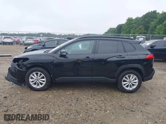 ✅ 2023 Toyota Corolla Cross LE • VIN: 7MUCAAAG0PV053404 • Лот: 42318679. Опубликован ранее на IAAI с пробегом 34 969 миль. Бесплатный доступ к архиву аукционных продаж из США и подробный отчёт об истории автомобиля на DreamBid. Изображение 15.