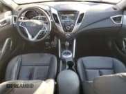 ✅ 2014 Hyundai Veloster • VIN: KMHTC6AD7EU213774 • Lot: 88239215. Wystawiony na Copart z przebiegiem 135 631 mil. Bezpłatny archiwum sprzedaży aukcyjnych z USA i szczegółowy raport historii pojazdu na DreamBid. Zdjęcie 8.