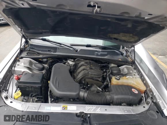 ✅ 2014 Dodge Challenger SXT • VIN: 2C3CDYAG2EH285500 • Lot: 81354794. Wystawiony na Copart z przebiegiem 132 370 mil. Bezpłatny archiwum sprzedaży aukcyjnych z USA i szczegółowy raport historii pojazdu na DreamBid. Zdjęcie 11.