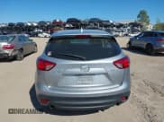 ✅ 2016 Mazda CX-5 Sport • VIN: JM3KE2BE9G0915168 • Lot: 41482749. Wystawiony na IAAI z przebiegiem 86 802 mil. Bezpłatny archiwum sprzedaży aukcyjnych z USA i szczegółowy raport historii pojazdu na DreamBid. Zdjęcie 16.