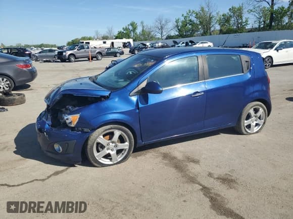 ✅ 2012 Chevrolet Sonic LTZ • VIN: 1G1JE6SH2C4211444 • Lot: 54013075. Listed on Copart with 97,378 mi. Free auction sales archive from the USA and detailed vehicle history report at DreamBid. Image 1.