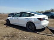 ✅ 2021 Tesla Model 3 Standard Range Plus • VIN: 5YJ3E1EAXMF977983 • Лот: 53858465. Опубликован ранее на Copart с пробегом 28 279 миль. Бесплатный доступ к архиву аукционных продаж из США и подробный отчёт об истории автомобиля на DreamBid. Изображение 2.