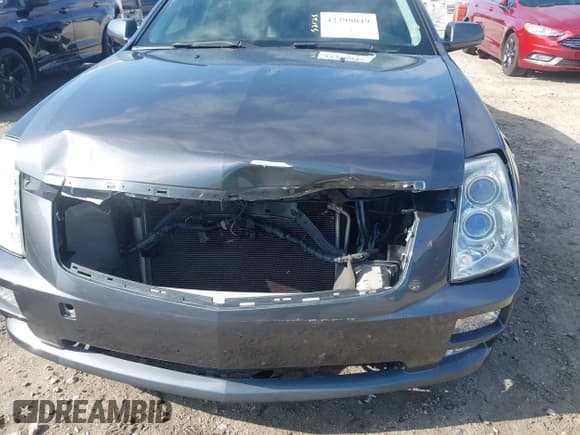 ✅ 2007 Cadillac STS • VIN: 1G6DW677070157028 • Лот: 42298049. Опубликован ранее на IAAI с пробегом 125 481 миль. Бесплатный доступ к архиву аукционных продаж из США и подробный отчёт об истории автомобиля на DreamBid. Изображение 6.