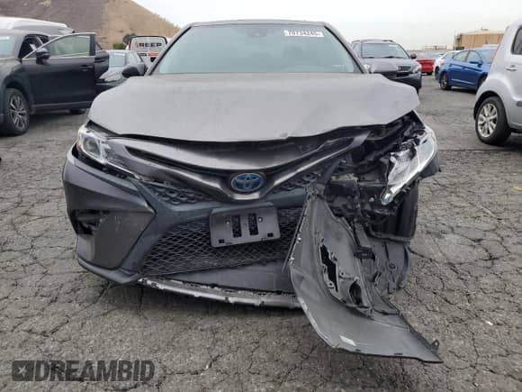 2020 Toyota Camry Hybrid SE с VIN 4T1G31AK2LU519524, выставлен на аукционе Copart как лот 70734245 с пробегом 85 086 миль миль и Списание • Salvage title. История ставок и продаж доступна на DreamBid. Изображение 5.