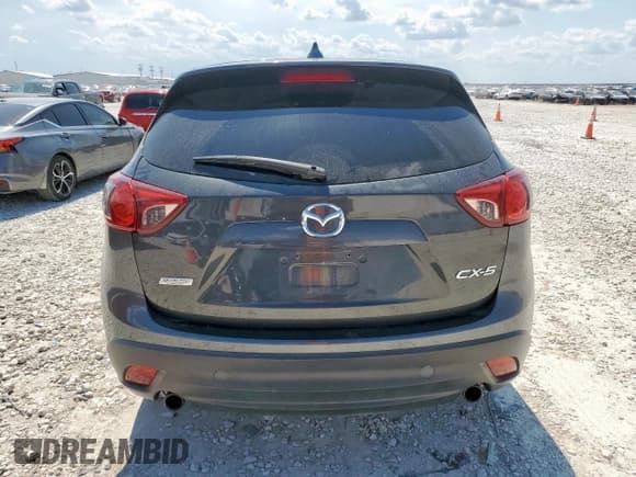 ✅ 2014 Mazda CX-5 Sport • VIN: JM3KE2BE5E0386119 • Lot: 68226855. Listed on Copart with 310,877 mi. Free auction sales archive from the USA and detailed vehicle history report at DreamBid. Image 6.