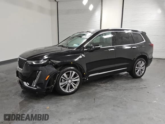✅ 2025 Cadillac XT6 AWD Premium Luxury • VIN: 1GYKPDRS2SZ119323 • Lot: 90238605. Listed on Copart with 13,649 mi. Free auction sales archive from the USA and detailed vehicle history report at DreamBid. Image 1.