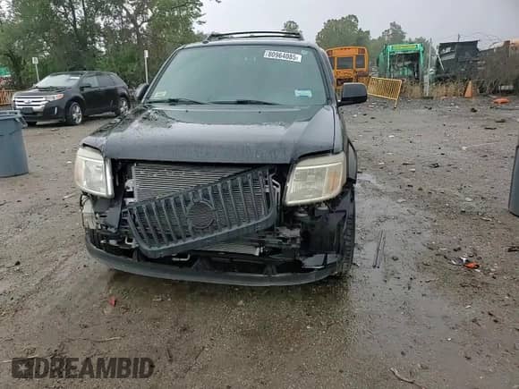 2010 Mercury Mariner Premier с VIN 4M2CN9HG7AKJ19586, выставлен на аукционе Copart как лот 80964085 с пробегом 192 530 миль миль и Списание • Salvage title. История ставок и продаж доступна на DreamBid. Изображение 14.