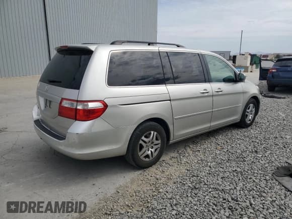 ✅ 2006 Honda Odyssey EX-L • VIN: 5FNRL38656B410666 • Лот: 80554015. Опубликован ранее на Copart с пробегом 243 001 миль. Бесплатный доступ к архиву аукционных продаж из США и подробный отчёт об истории автомобиля на DreamBid. Изображение 3.