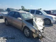 ✅ 2000 Toyota Camry LE • VIN: JT2BG22KXY0404152 • Лот: 43419402. Опубликован ранее на IAAI с пробегом Не указан. Бесплатный доступ к архиву аукционных продаж из США и подробный отчёт об истории автомобиля на DreamBid. Изображение 1.