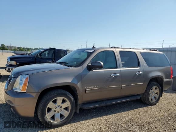 ✅ 2012 GMC Yukon XL SLT • VIN: 1GKS2KE77CR191697 • Lot: 62920975. Listed on Copart with 183,433 mi. Free auction sales archive from the USA and detailed vehicle history report at DreamBid. Image 1.