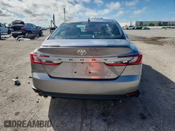 2025 Toyota Camry SE with VIN 4T1DAACK0SU629914, listed as a Copart auction lot 90032825 with 9,436 mi miles and Salvage title. Bid and sale history available at DreamBid. Image 6.