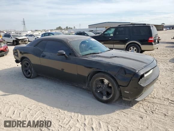 ✅ 2013 Dodge Challenger SXT • VIN: 2C3CDYAGXDH616273 • Lot: 76766114. Wystawiony na Copart z przebiegiem 136 862 mil. Bezpłatny archiwum sprzedaży aukcyjnych z USA i szczegółowy raport historii pojazdu na DreamBid. Zdjęcie 4.
