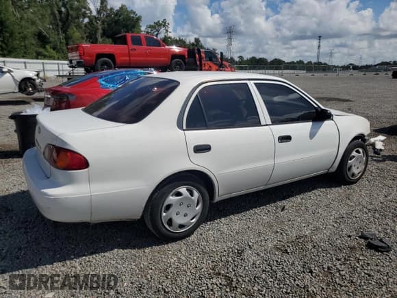 ✅ 2001 Toyota Corolla CE • VIN: 1NXBR12E71Z543445 • Lot: 69626264. Wystawiony na Copart z przebiegiem 101 547 mil. Bezpłatny archiwum sprzedaży aukcyjnych z USA i szczegółowy raport historii pojazdu na DreamBid. Zdjęcie 3.