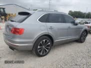 ✅ 2019 Bentley Bentayga V8 • VIN: SJAAM2ZV9KC026702 • Lot: 69277485. Listed on Copart with 45,515 mi. Free auction sales archive from the USA and detailed vehicle history report at DreamBid. Image 3.